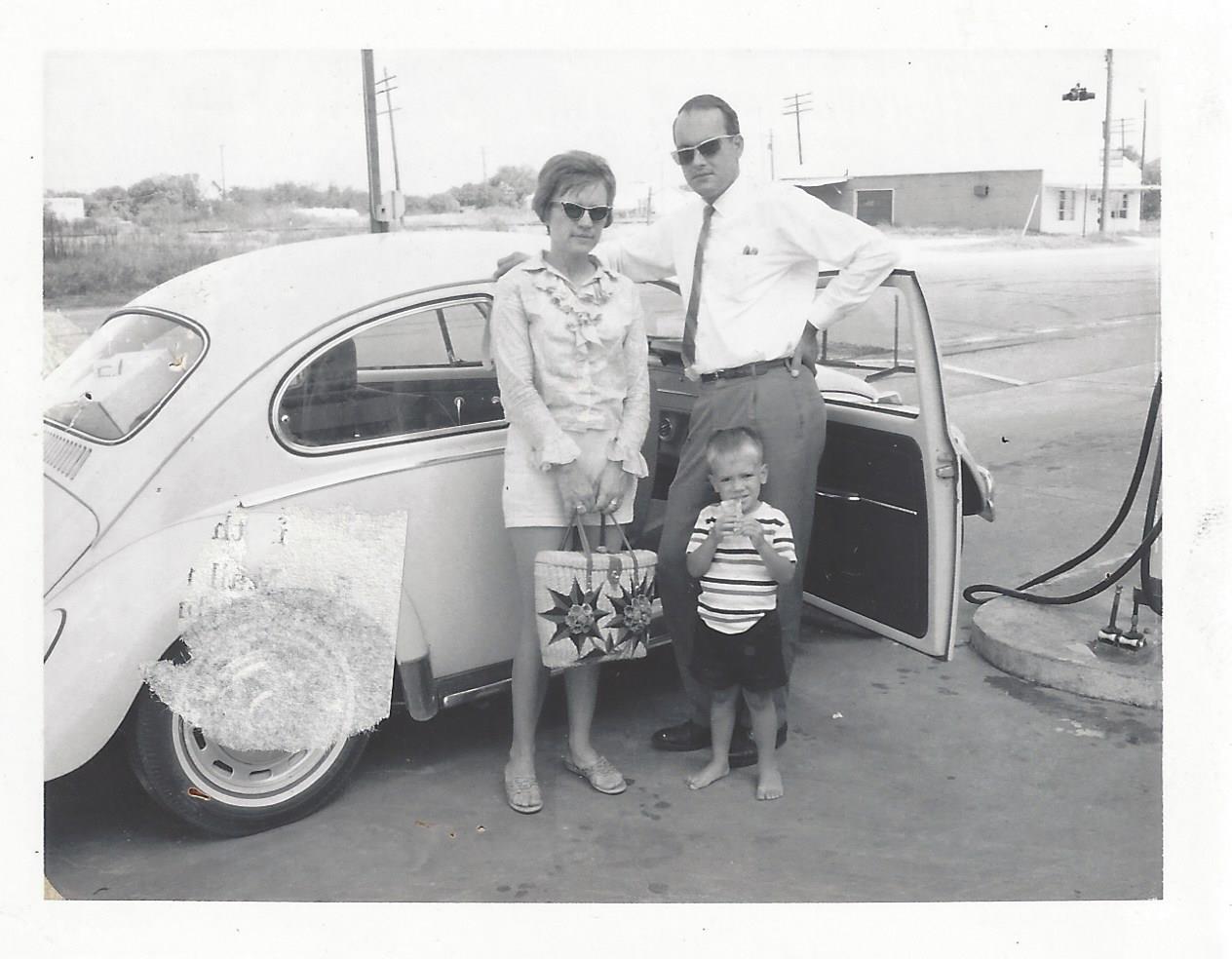 Ann with family at VW Beetle