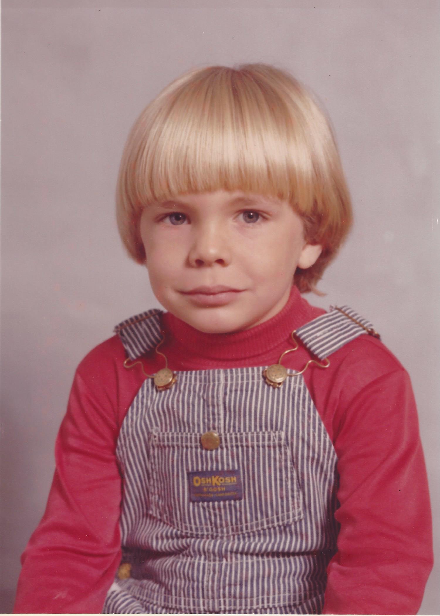 Young Peter in OshKosh overalls