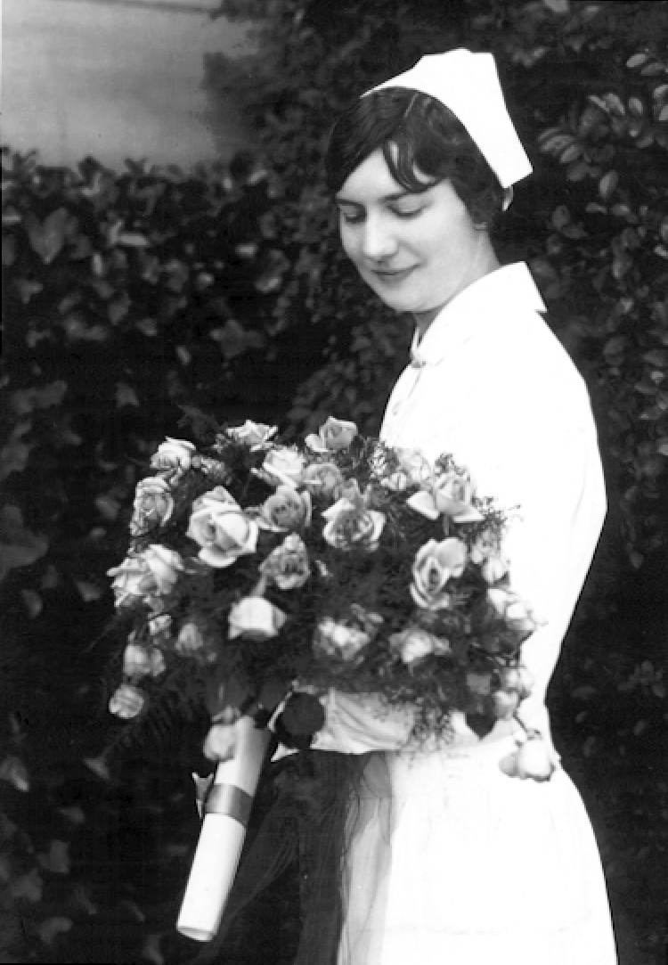 Virge in nursing uniform with diploma, 1927