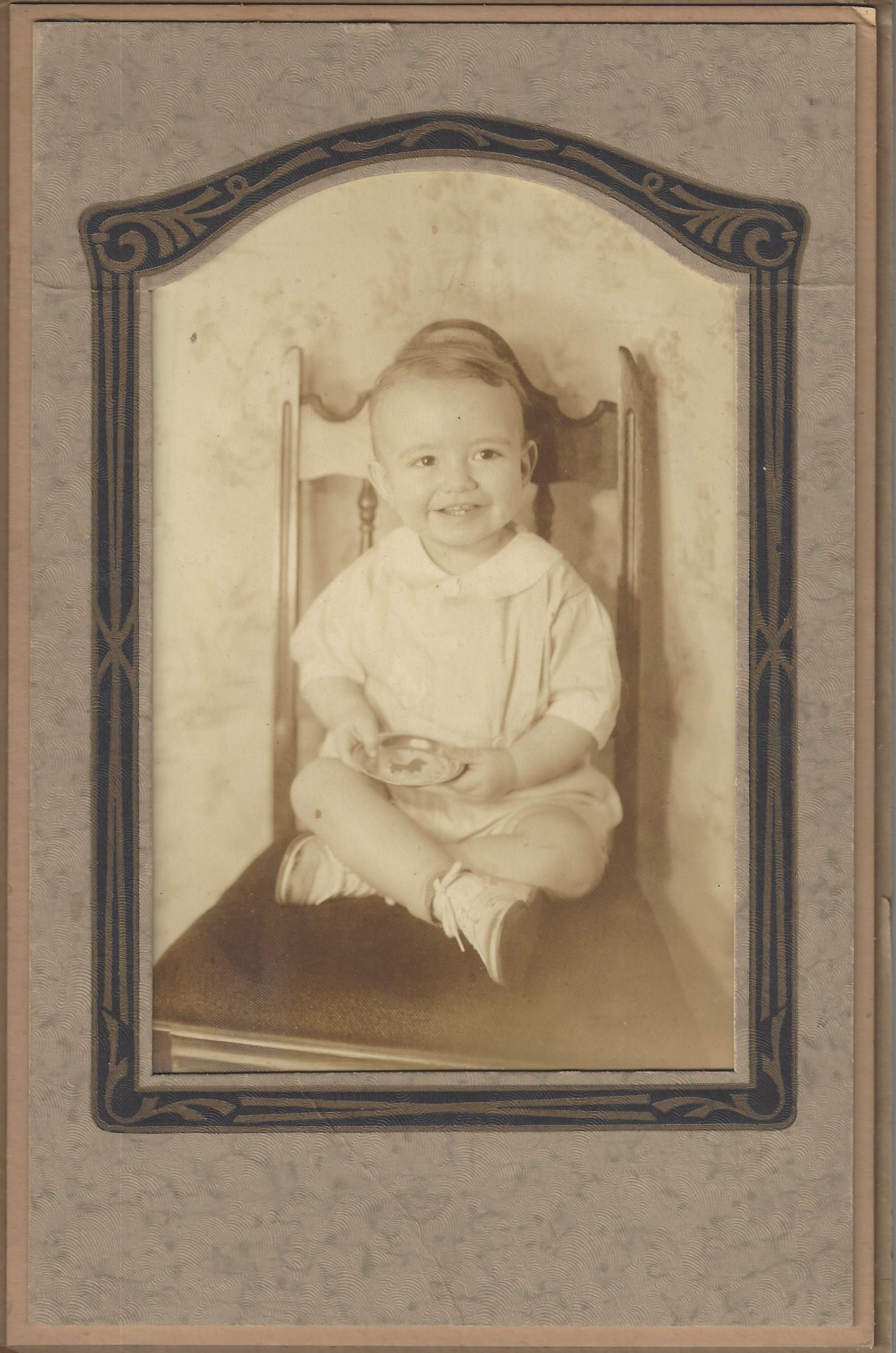 Unknown baby in ornate frame